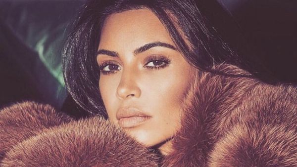 Kim Kardashian followed-up her cherry blossom baby shower by using this picture to describer her mood. (Instagram / kimkardashian)