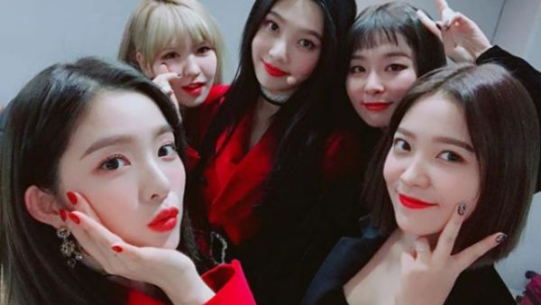 The K-pop stars released the repackaged album The Perfect Red Velvet and a sultry music video for their new single "Bad Boy." (Source: redvelvet.smtown - Instagram)
