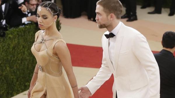 Robert Pattinson and sort-of fiance FKA twigs. (John Angelillo / UPI)