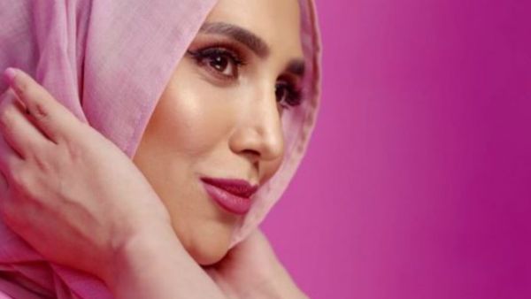 As the first woman wearing a headscarf to feature in a major mainstream hair campaign, Khan called the collaboration “game changing.” (Source: @amenaofficial - Instagram)