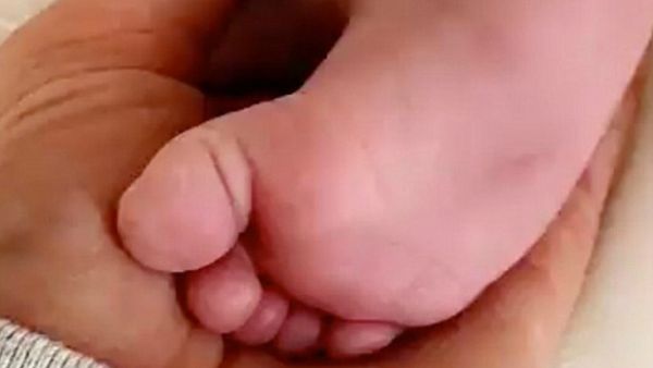 Too cute: Kylie Jenner, 20, doted on her baby daughter Stormi in a Snapchat clip posted Sunday, in which she played with her infant daughter's feet (Source: Kylie Jenner - Snapchat) Too cute: Kylie Jenner, 20, doted on her baby daughter Stormi in a Snapchat clip posted Sunday, in which she played with her infant daughter's feet (Source: Kylie Jenner - Snapchat)