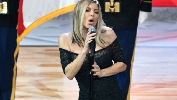 The 42-year-old singer performed the 'Star-Spangled Banner' at Los Angeles' Staples Center on Sunday (02.18.18)  (Source: ALLEN BEREZOVSKY / GETTY IMAGES NORTH AMERICA / AFP)