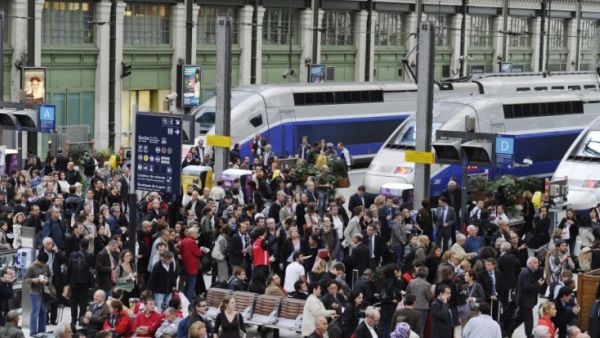 Commuters crowd the platform at the Gare de Lyon train station, where three women were recently arrested on suspicion of plotting an attack. (AFP/File)