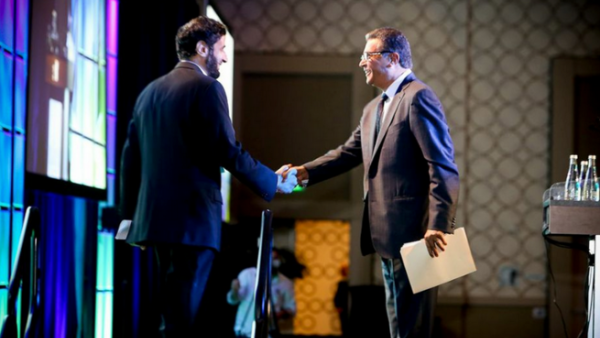 H.E. Dr. Tawfig Alrabiah, Minister of Commerce and Industry shakes hands with Omar Farid, who has been appointed as the President for Middle East and Africa for PepsiCo, (Image credit: Saudi US Trade Group)