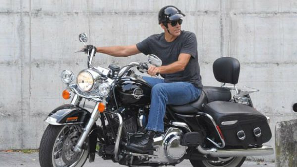 On the go: Amal has reportedly tried to get her husband off of motorcycles for good, after he was hospitalized following a scooter crash in Italy back in July (Source: Picture Perfect - REX - Shutterstock) On the go: Amal has reportedly tried to get her husband off of motorcycles for good, after he was hospitalized following a scooter crash in Italy back in July (Source: Picture Perfect - REX - Shutterstock)