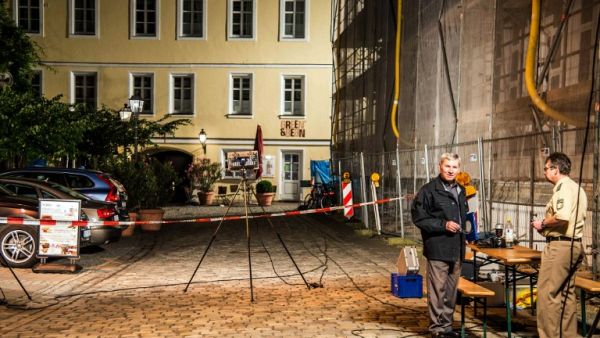Officers are seen at police cordon near the site of a suicide attack in the southern German city of Ansbach on 25 June, 2016. (AFP/DPA)