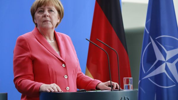 German Chancellor Angela Merkel is given 2-week deadline by her coalition partners, the Christian Social Union, over stricter migration and asylum rules. (Shutterstock)