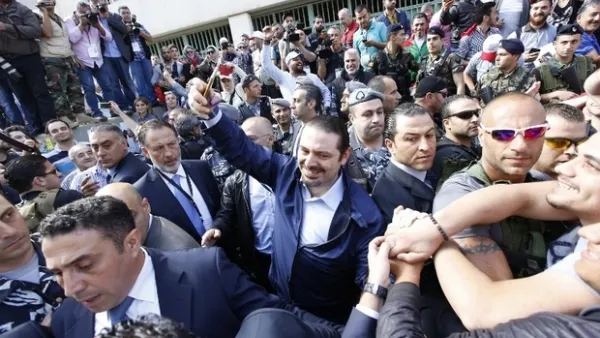 Saad Hariri takes a selfie after leaving a polling station in past poll (AFP/File Photo)	