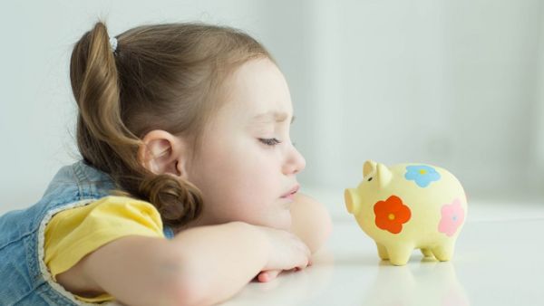 Here are some interesting ways to teach children how to save money at an early age. (Shutterstock)