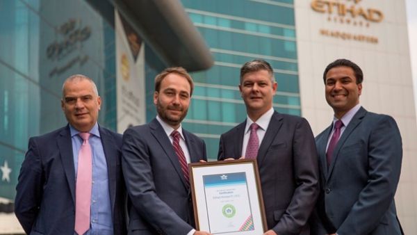 Michael Herero, IATA Area Manager Gulf, second left, presenting the certificate to Etihad Airways management, from left, Umberto Nicolardi, Head of E-Commerce; Justin Warby, Vice President Digital Transformation and Innovation; and Leslie Varghese, Senior Manager Distribution. Michael Herero, IATA Area Manager Gulf, second left, presenting the certificate to Etihad Airways management, from left, Umberto Nicolardi, Head of E-Commerce; Justin Warby, Vice President Digital Transformation and Innovation; and Leslie Varghese, Senior Manager Distribution.