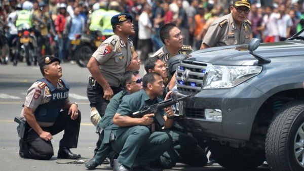 Security forces in Jakarta after an ISIS-linked attack in the city (Bay Ismoyo/AFP/Getty Images)