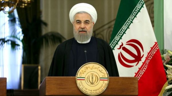 Iran's President Hassan Rouhani has slammed some arab countries for zero react against Israeli violence in Gaza. (AFP Photo/Atta Kenare)