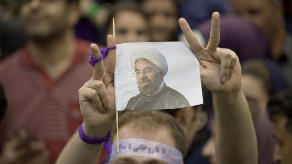 President Hassan Rouhani’s economic strategy is to significantly reduce the government’s dependency on oil and instead collect tax more systematically. (Shutterstock)
