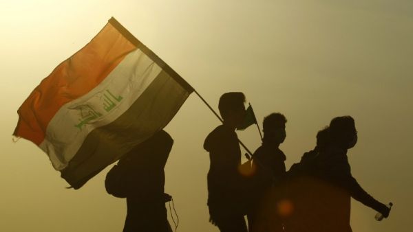 Pilgrims arrive at the Iraqi city of Karbala (Haidar Hamdani/AFP)