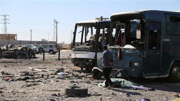 An Iraqi man walks near the site of a previous car bomb in Baghdad. (AFP/File)