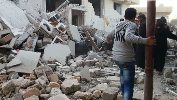 Archival image shows rubble from bombed-out buildings in the city of Raqqa, November 2014 (AFP)