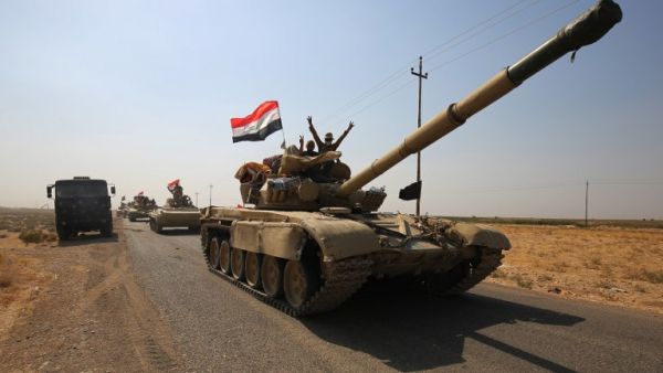 Iraqi forces drive towards Kurdish peshmerga positions on October 15, 2017, on the southern outskirts of Kirkuk (Ahmad Al-Rubaye/AFP)