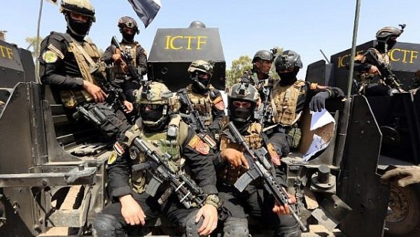 Members of Iraqi counter-terrorism forces take part in training under the command of international military instructors in Baghdad. (AFP/Sabah Arar)