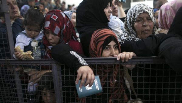 Palestinians wait at the Rafah border crossing with Egypt, in the southern Gaza Strip, after it was opened for two days by Egyptian authorities, on May 11, 2016. (AFP/Said Khatib)