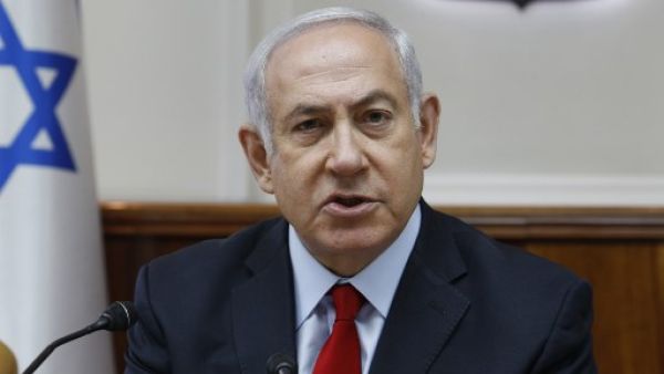Israeli Prime Minister Benjamin Netanyahu opens the weekly cabinet meeting at his Occupied Jerusalem office on July 23, 2018. (GALI TIBBON / POOL / AFP)