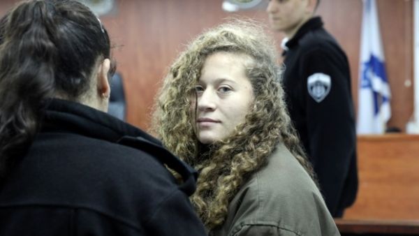 Ahed Tamimi is accused of throwing stones - a charge that carries a 10-year prison sentence. (AFP/ File Photo)
