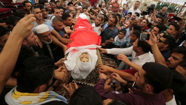 Thousands of Jordanians called for "death to Israel" as they attended the funeral of Jawawdeh who was shot dead by an Israeli embassy security guard. (Khalil Mazraawi/AFP)