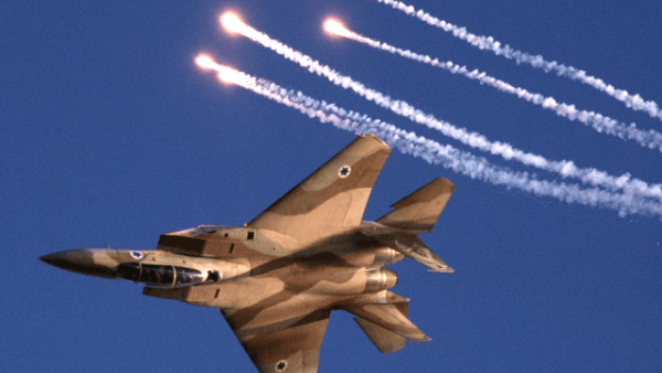 Israeli warplane has attacked a group of Palestinians trying to launch incendiary kites and balloons near border. (AFP/ File)