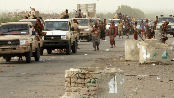 Yemeni pro-government forces arrive in al-Durayhimi district, about nine kilometres south of Hudaydah international airport. (AFP)