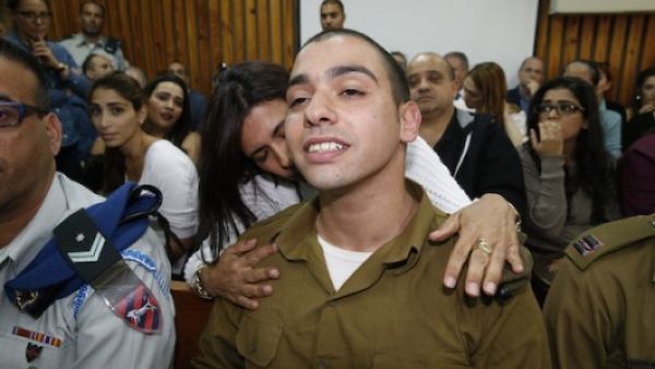 Israeli soldier Elor Azaria, who has been charged with manslaughter for shooting an incapacitated Palestinian stabbing suspect in Hebron, is seen in a military court, March 29, 2016. (AFP/File) 