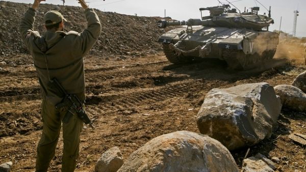 An Israeli tank near the border with Syria (AFP/File Photo)	