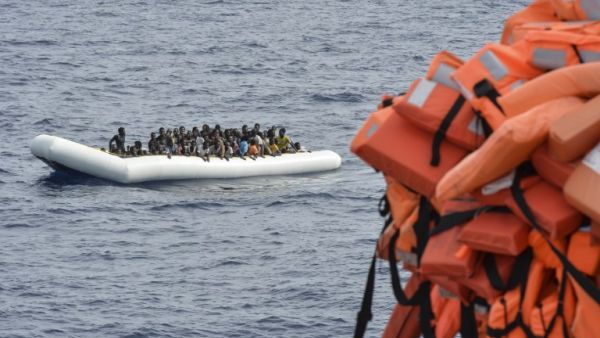 his file photo taken on November 05, 2016 shows migrants and refugees on a rubber boat waiting to be evacuated during a rescue operation by the crew of the Topaz Responder, a rescue ship run by Maltese NGO "Moas" and the Red Cross, on November 5, 2016 off the coast of Libya. (AFP/Andreas Solaro)