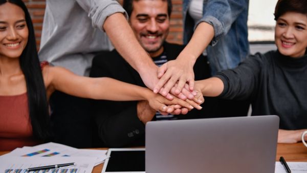 You typically spend eight hours of your day with those people, thus, it is essential to make sure you get along with everyone to reach your common goals and success metrics. Starting and maintaining friendly relationships will ease your day at work and help you work better. (Shutterstock)