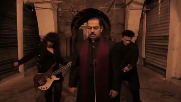 Lutfi Boshnaq (center) is the frontman for a newly formed Islamic metal band based in Tunisia. (Youtube)