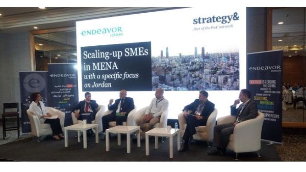 Panelists discuss issues facing scale-up small-and medium-enterprises in the Middle East and North Africa during a meeting organised by Endeavor Jordan and Strategy & Middle East in Amman, on Sunday. (Jordan Times)