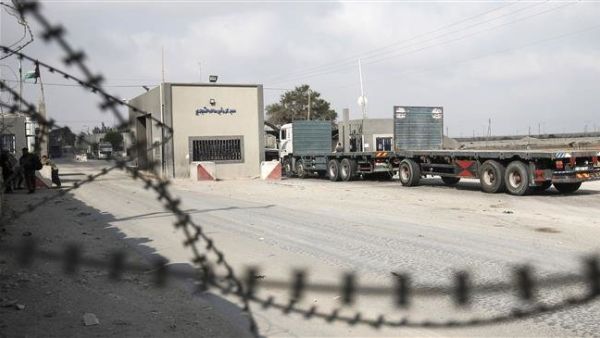 A truck is seen at the gate of Kerem Shalom crossing, the main passage point for goods entering Gaza, in the town of Rafah, the southern Gaza Strip. (AFP/File)