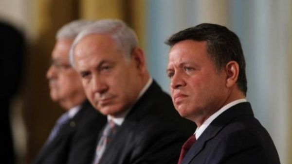 King Abdullah II and Israeli PM Benjamin Netanyahu listen to remarks on September 1, 2010 in Washington, DC. (AFP/ File Photo)