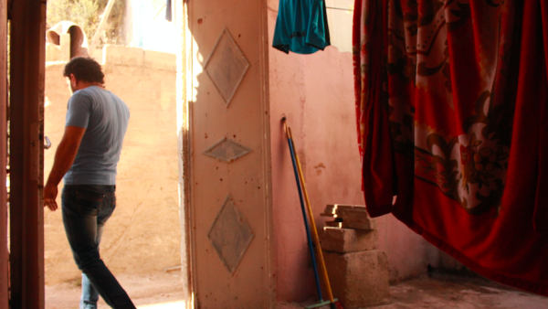 After fleeing to Syria with his family, Omar attempted to return to Iraq alone. /Jason Ruffin