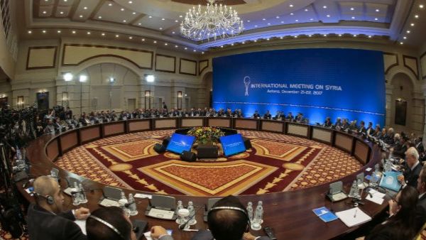 Syrian regime representatives and opposition delegates along with other attendees take part in Syria peace talks in Astana (AFP/File Photo) Syrian regime representatives and opposition delegates along with other attendees take part in Syria peace talks in Astana (AFP/File Photo)