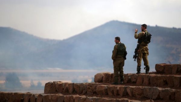 Israeli soldiers in the Israeli-annexed Golan Heights (AFP/File Photo)