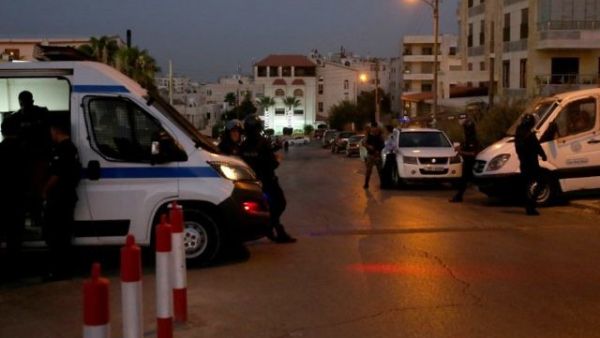 Jordanian security forces fined more than 7,00 divers over using phones while driving. (AFP/ File)