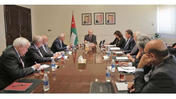 Prime Minister Omar Razzaz meets with the International Advisory Group in Amman on Thursday. (Jordan Times)