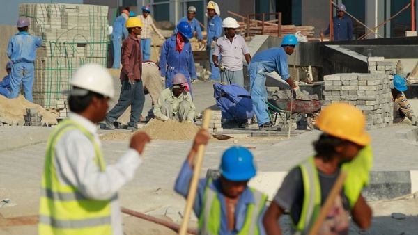 Qatar revamps its work visa rules for expats amid accusations that some sectors, especially construction, are rife with abuse of migrant workers. (AFP/Karim Jaafar)
