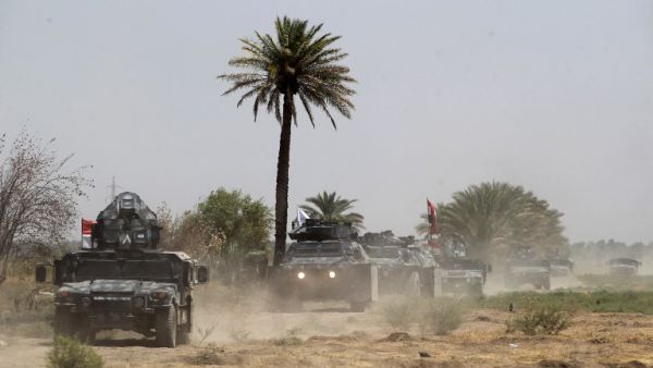 Iraqi forces traveling to Khalidiya. (AFP/File)