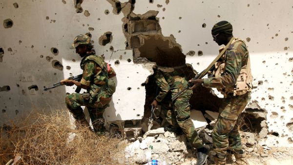 Libyan forces patrol in Benghazi in April (AFP)