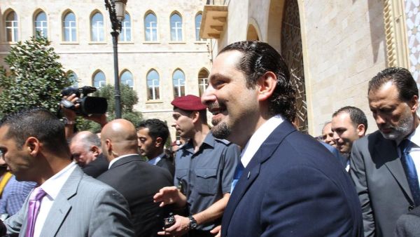 Lebanese premier Saad Hariri, centre, leaves Lebanon's Grand Serail government palace in Beirut. (AFP/ File)