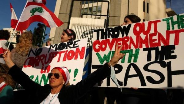 Lebanese women protest the trash crisis in Beirut. (AFP/Patrick Baz)