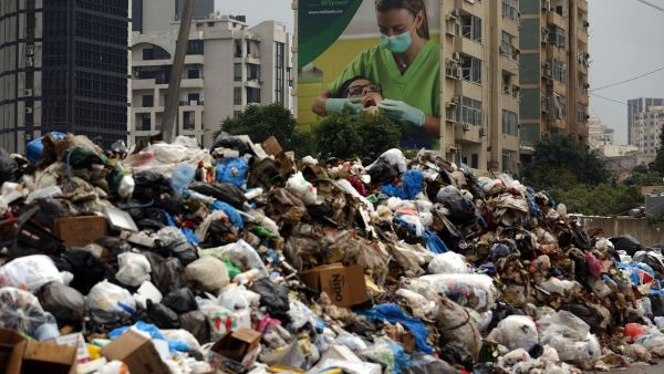 A street in Beirut, Lebanon full of garbage. (AFP / Patrick Baz)