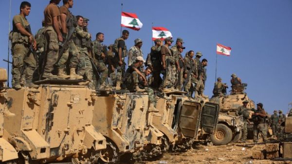 Lebanese soldiers stand on armoured vehicles. (AFP/ File)