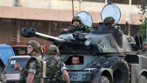 A Lebanese army vehicle patrol the northern city of Tripoli on April 2, 2014. (AFP/Ibrahim Chalhoub)