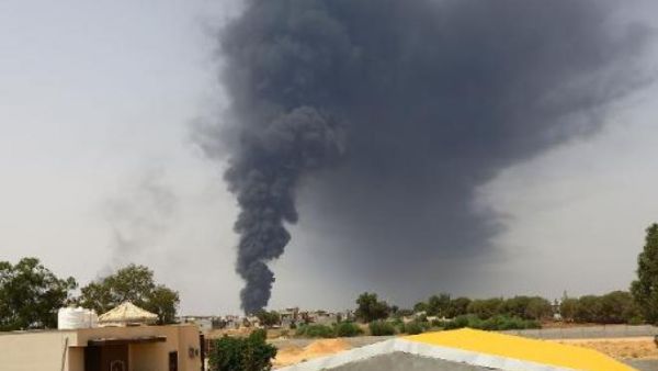 Smoke billows from a fire at a Libya oil depot in 2014. (AFP/File)